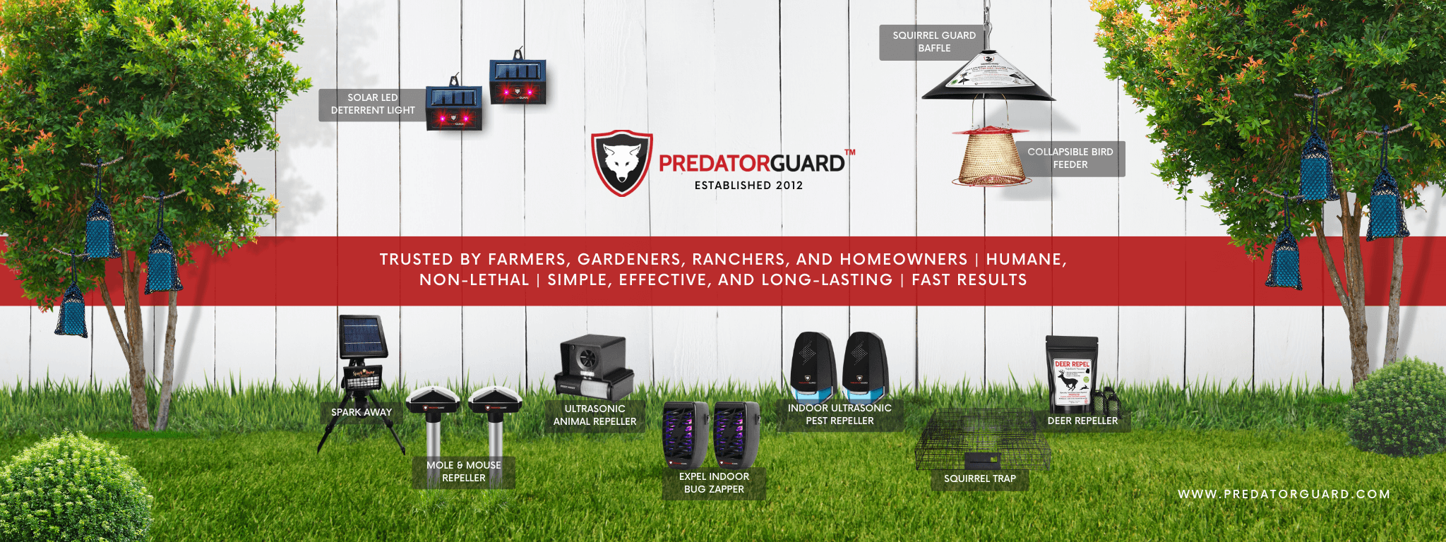 Predator Guard products attached on backyard fence, grass, and trees